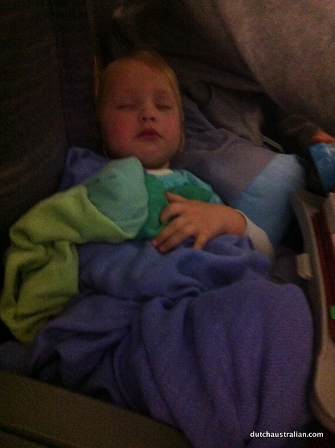 toddler sleeping on plane