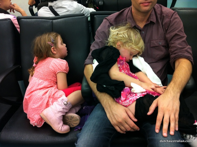 sleeping girls at airport
